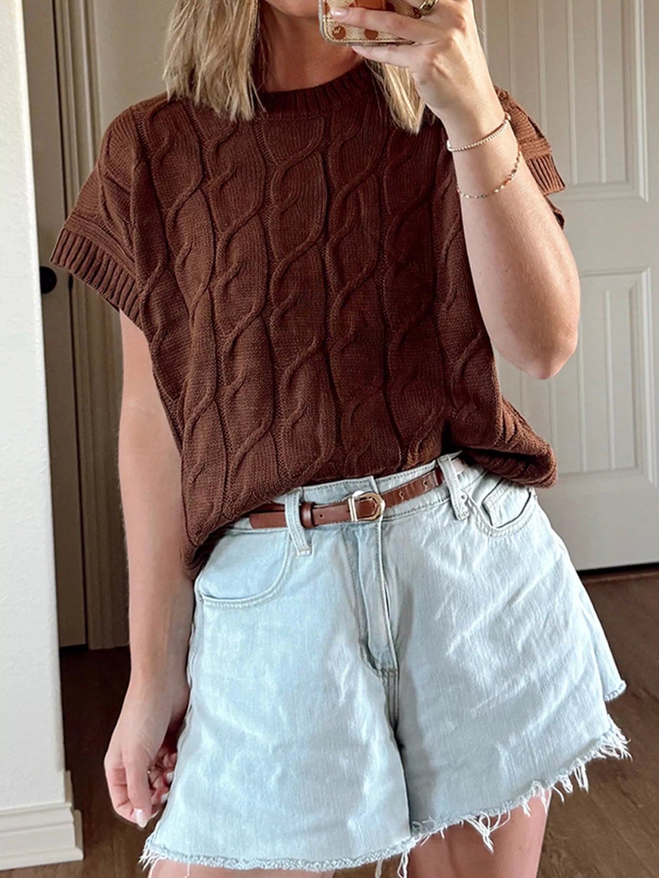 Lova kabelstickad tröja i bomull med rund hals och kort ärm