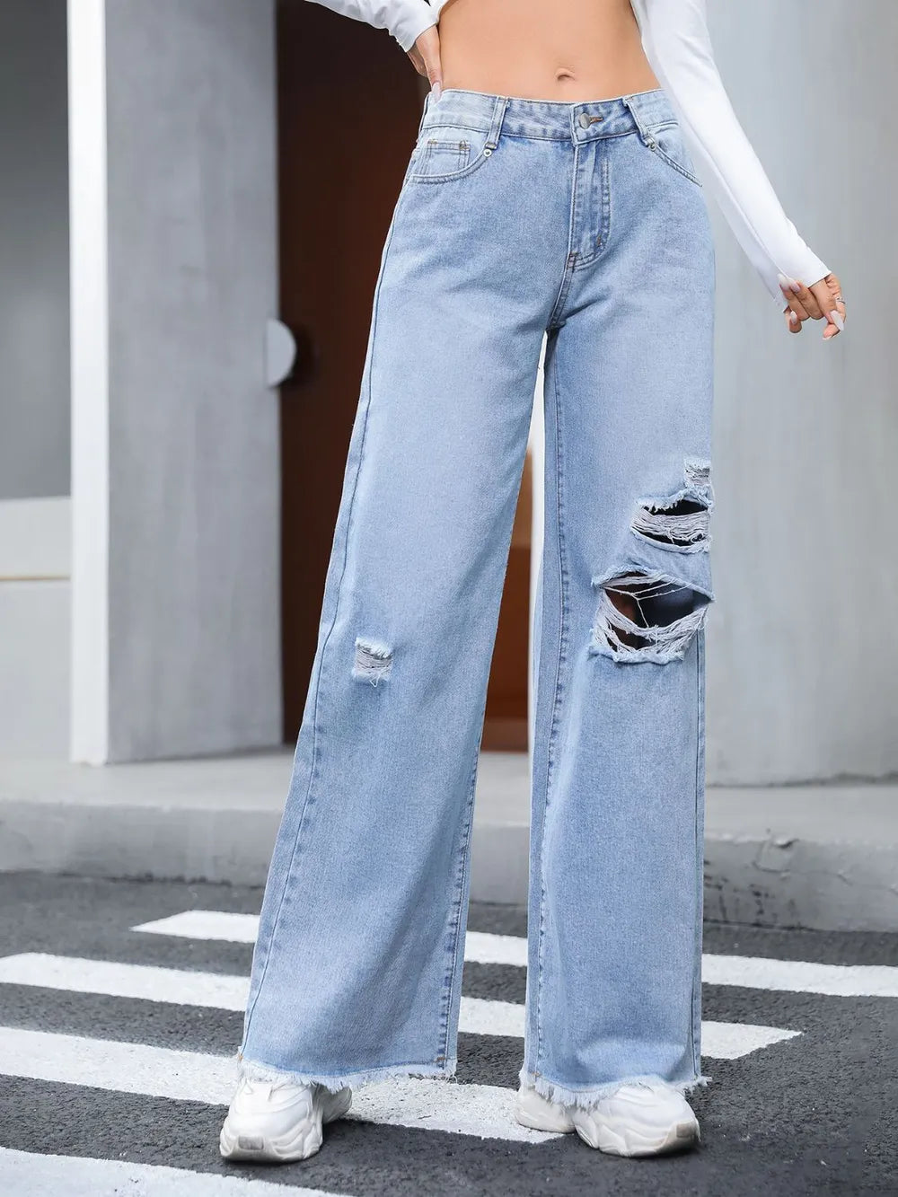 Denise - Slitna jeans med vida ben och råkant för vardag