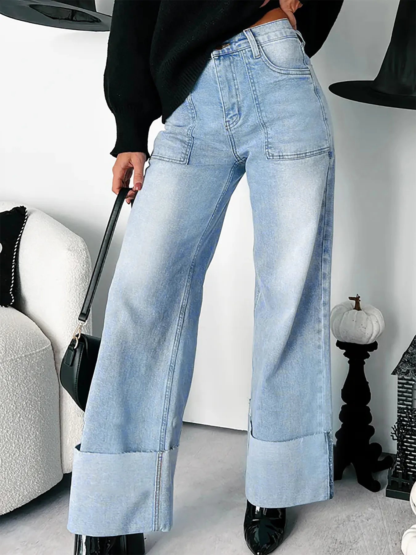 Jasmine - Högmidjade vida jeans med uppvikta fåll bekväma