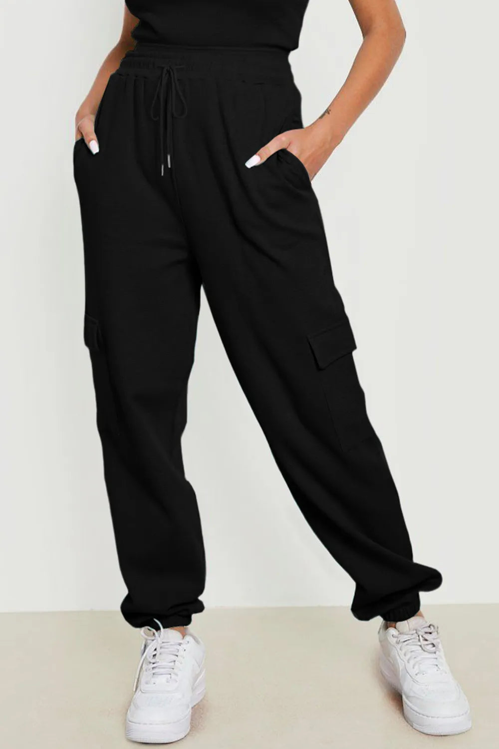 Linda - Dragsko byxor med fickor i mjuk polyester elastan